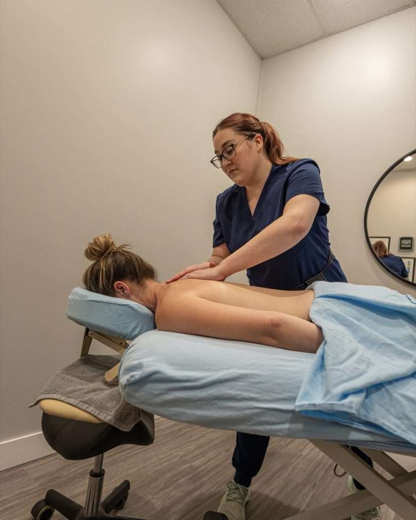 Registered massage therapist performing massage therapy